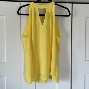 Yellow sleeveless summer shirt